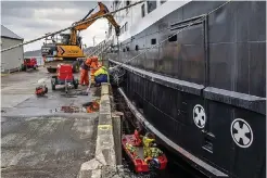  ?? ?? Damage: Repair work on the MV Hebrides yesterday