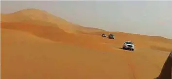  ?? Courtesy: Al Arabiya ?? Saudi researcher and TV presenter Eid Al Yahya said the journey to the top of the dune in the Dhofar governorat­e took more than three hours with the help of guides from Al Musn tribe.