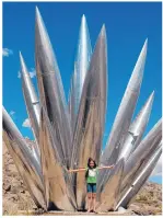  ??  ?? Artist Gordon Huether’s 22-foot-tall sculpture “Aluminum Yucca” in Tijeras Canyon. ‘Fire Rocket’ by Peter Reiquam at AFD Station 2 on Gibson near I-25.