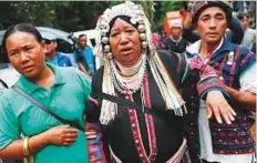  ?? Reuters ?? An ethnic Akha woman prays for the return of the missing members of an under-16 soccer team and their coach, near the Tham Luang cave complex, as search efforts continue.