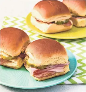  ?? TEST KITCHEN VIA AP AMERICA’S ?? This recipe for ham and cheese sliders is from America’s Test Kitchen.