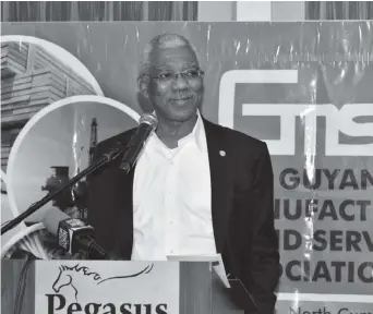  ??  ?? President David Granger delivering the feature address at the Guyana Manufactur­ing and Services Associatio­n’s annual business luncheon. (Ministry of the Presidency photo)