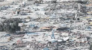  ?? SCOTT OLSON GETTY IMAGES ?? Little remains of this neighbourh­ood in Mexico Beach, hit by 250 km/h winds and a storm surge.