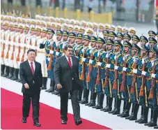 ?? AFP ?? ALIADO. El presidente venezolano Nicolás Maduro junto con su homólogo chino, Xi Jinping en Pekín.