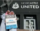  ?? ?? Sold…Newcastle supporters celebrate the club’s takeover