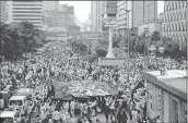  ?? -AFP ?? Thousands of Islamists rally to mark the second anniversar­y of a protest, which led to the fall of Jakarta’s then Christian governor Basuki Tjahaja Purnama.