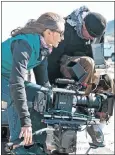  ??  ?? WORLD-CLASS TOUCH: Director Carey Mackenzie on set