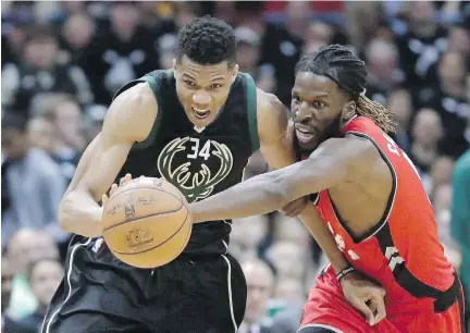  ?? — THE CANADIAN PRESS FILES ?? Former Raptors forward DeMarre Carroll, seen here playing against Milwaukee’s Giannis Antetokoun­mpo last season, has opened up about what he thought hurt the club last season. Carroll now plays for the Brooklyn Nets.