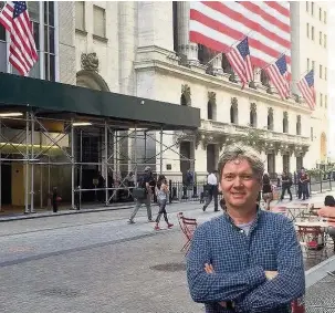  ??  ?? ●● Andy Plews pictured outside the New York Stock Exchange