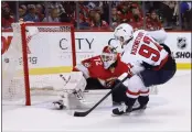  ?? REINHOLD MATAY — THE ASSOCIATED PRESS ?? Capitals center Evgeny Kuznetsov (92) scores against Panthers goaltender Sergei Bobrovsky (72) during the third period of Game 1on Tuesday in Sunrise, Fla.