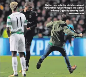  ?? ANDREW MILLIGAN ?? Hatton runs onto the pitch to confront PSG striker Kylian Mbappe, and is then
led away (right) by security staff