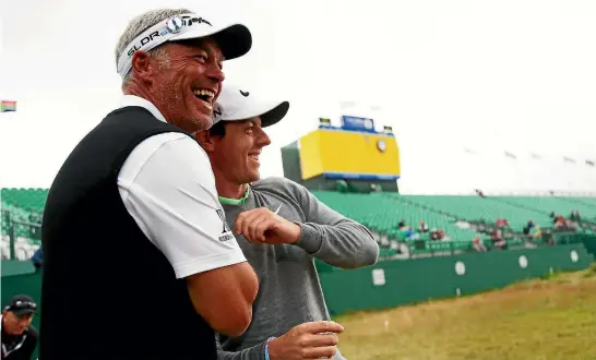  ?? PHOTO: GETTY IMAGES ?? European captain Darren Clarke and Rory McIlroy have had a long and close relationsh­ip.