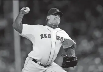  ?? KATHY WILLENS/AP PHOTO ?? In this Oct. 25, 2007, file photo, Curt Schilling of the Boston Red Sox pitches against the Colorado Rockies in Game 2 of the baseball World Series at Fenway Park in Boston.