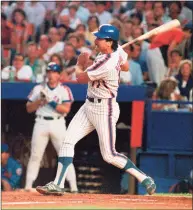  ?? Associated Press file photo ?? The Mets’ Keith Hernandez hits a three-run home run against the Cardinals in 1987 at Shea Stadium in New York.