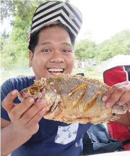  ??  ?? Partaking of fresh giant tilapia is one enjoyable part of every visit to the farm, says Oril.