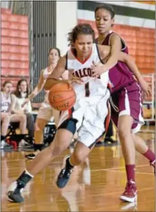  ?? File photo by Michael Bucher ?? Three players for Pennsbury registered double digits including Kait Kelly and Taylor Ferguson. Senior Jae Jackson, pictured here, notched eight points in a 20-point win for the Falcons.