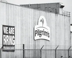  ?? DAVE SCHWARZ AP ?? Pilgrim’s Pride was accused of restrainin­g competitio­n in the poultry industry.