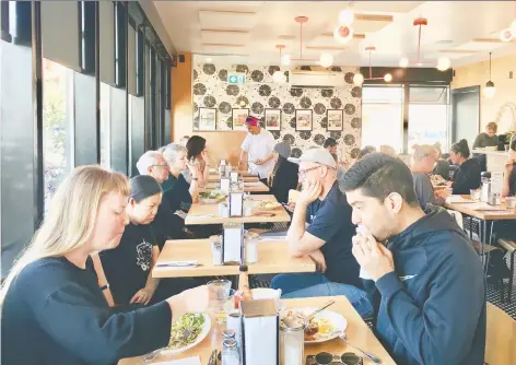  ?? PHOTOS: MIA STAINSBY ?? Douce Diner chef and owner Dawn Doucette works the front of house in her trendy new eatery in North Vancouver.