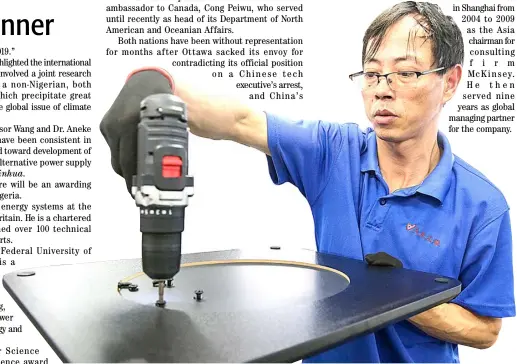  ??  ?? CHINESE worker produces desks for export to the US, France, Germany and other countries at a factory in Nantong in China’s eastern Jiangsu province.