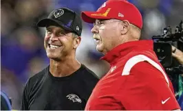  ?? JULIO CORTEZ / AP ?? Ravens head coach John Harbaugh (left) and Chiefs head coach Andy Reid chat before a game in 2021 in Baltimore. Harbaugh once beat his own brother to win the Super Bowl, so facing a mentor today probably won’t rattle him.