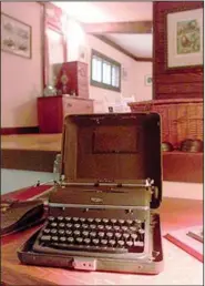  ?? (AP file photo) ?? A 1930s-era typewriter sits on the desk used by Ernest Hemingway in a converted barn in Piggott. A fire in the now-restored barn in December 1932 destroyed some of Hemingway’s guns, clothes, books and manuscript­s.