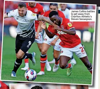  ?? ?? James Collins battles to get away from Charlton Athletic’s Steven Sessegnon.