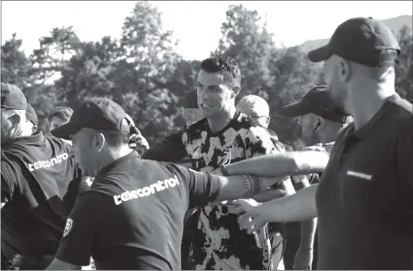  ?? Photo: VCG ?? Juventus’ Portuguese superstar Cristiano Ronaldo leaves the field as invaders run onto the pitch after a friendly match between Juventus A and Juventus B in Villar Perosa, Italy.