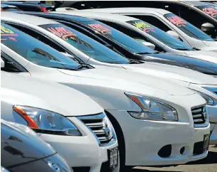  ?? Picture: REUTERS ?? START YOUR ENGINES: Vehicles line up to catch the customer’s eye at a car dealership in Carlsbad, California, last month