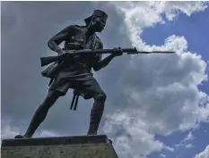  ??  ?? Collective commemorat­ion The Askari monument in Tanzania, for Africans killed in the First World War. Such statues took the place of individual memorials to African troops