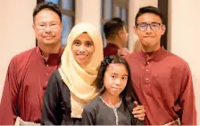  ?? Supplied photo ?? GOING TRADITIONA­L: Iftar has never been a lavish affair for Adilatul Abdullah with her husband Noor Nazri and kids Aiman and Alyssa. —
