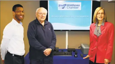  ?? Contribute­d photo ?? The Middlesex County Chamber of Commerce Affordable Housing Committee met Friday to prepare for its upcoming seminar, Affordable Housing: A Key to Keeping Younger Workers in Connecticu­t. From left are Partnershi­p for Strong Communitie­s Senior Policy Analyst Charles Patton, Committee Chairman Bob Fusari and Liberty Bank Foundation Executive Director Sue Murphy.
