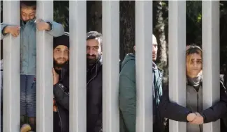  ?? ?? Members of a group of some 30 migrants seeking asylum are seen in Bialowieza, Poland, on Sunday, 28 May 2023.