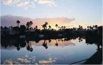  ??  ?? The Chateau at Lake La Quinta is southeast of Palm Springs and features a good restaurant and lovely units on a small lake.