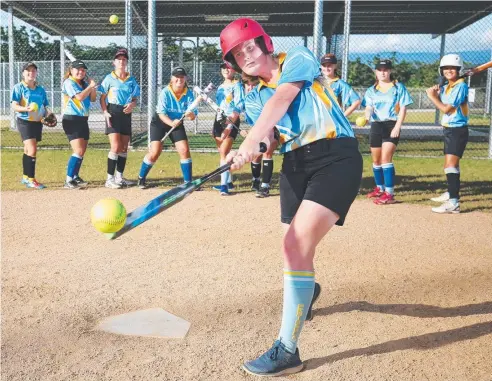  ?? Picture: BRENDAN RADKE ?? OUT SWINGING: Batter Samantha Ladner with her team of Under 13-19 schoolgirl­s compete in the state softball championsh­ips at the new Edmonton playing fields.