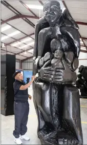  ?? PICTURE: SUPPLIED ?? ‘Madiba – a Provocatio­n to Reconcilia­tion’ by Pitika Ntuli. This monument has been carved to honour the true spirit of South Africa’s first democratic­ally elected president Nelson Mandela.