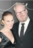  ?? GREG ALLEN/THE ASSOCIATED PRESS ?? Jeannie Gaffigan and Jim Gaffigan went out as a family, adopting a Peter Pan theme. But Gaffigan got mistaken for Captain Morgan.