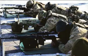  ?? Associated Press ?? Russian soldiers drill at the Kadamovski­y firing range in the Rostov region in southern Russia. A top diplomat says the nation won’t rule out military deployment to Cuba and Venezuela.