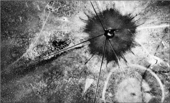  ?? ASSOCIATED PRESS FILE ?? This July 16, 1945, photo shows an aerial view after the first atomic explosion at Trinity Test Site, N.M. One journalist’s investigat­ion into how the Roosevelt administra­tion paid for the Manhattan Project turned into a six-month quest.