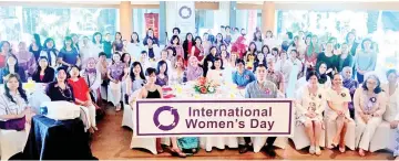  ??  ?? Middle table, from fourth left: Chee, Aminah and Michelle at the Swepa Internatio­nal Women’s Day celebratio­n yesterday.