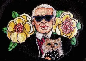  ??  ?? This eye-catching piece by Wong features the late fashion designer Karl Lagerfeld with his pet cat, Choupette.