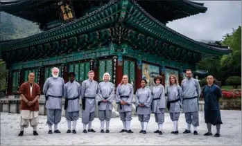  ?? ?? Anne Sofie Espersen (nummer tre fra højre) er vaeret i Sydkorea med otte andre danske kendisser for for at vaere med i programmet ”Shaolin”. Sidste afsnit kan ses i aften på TV 2. Foto: TV 2