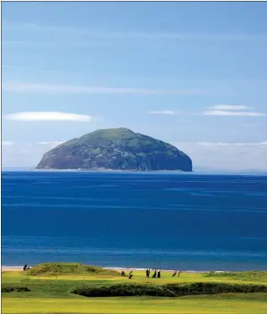  ??  ?? „ The stunning Ailsa Craig rock is 10 miles from the shore of Turnberry in South Ayrshire.