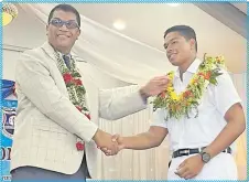  ?? Picture: ANA MADIGIBULI ?? A prefect of MGM High School is being badged by the Education Minister Aseri Radrodro at Kshatriya Hall in Suva earlier this month.