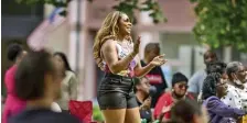  ?? AP FILE ?? HEADING FOR A HOLIDAY: Gabriella Harris of Philadelph­ia applauds as her mother finishes a performanc­e at a Juneteenth celebratio­n Sunday in Johnstown, Pa.