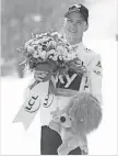  ?? STEPHANE MANTEY, AP ?? Chris Froome thanked his wife and infant son during his speech.