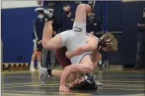  ?? AUSTIN HERTZOG - MEDIANEWS GROUP ?? Upper Perkiomen’s Soren Svanson tries to flip for an escape from Pottsgrove’s Antonio Curran at 172pounds Wednesday.