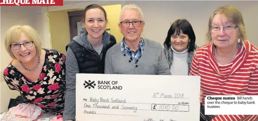  ??  ?? Cheque mates Bill hands over the cheque to baby bank trustees