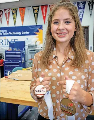  ?? [PHOTOS PROVIDED] ?? Emily Haas, a junior at Deer Creek and Francis Tuttle Pre-Engineerin­g Academy, won first place in the national SkillsUSA Principles of Engineerin­g &amp; Technology competitio­n.