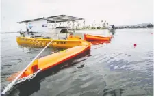  ??  ?? FRED is a solar-powered catamaran that extracts waste from water. It’s one of many global ventures trying to clean up plastic in the oceans.