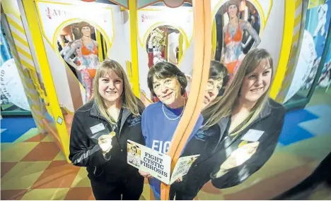  ?? BOB TYMCZYSZYN/STANDARD STAFF ?? Debbie Graham, attraction­s general manager at Guinness World Records, left, and Nancy Clayton, vice-president of the Niagara chapter of Cystic Fibrosis Canada, are getting ready for the annual $1 Museum Day on Clifton Hill in support of Cystic Fibrosis...